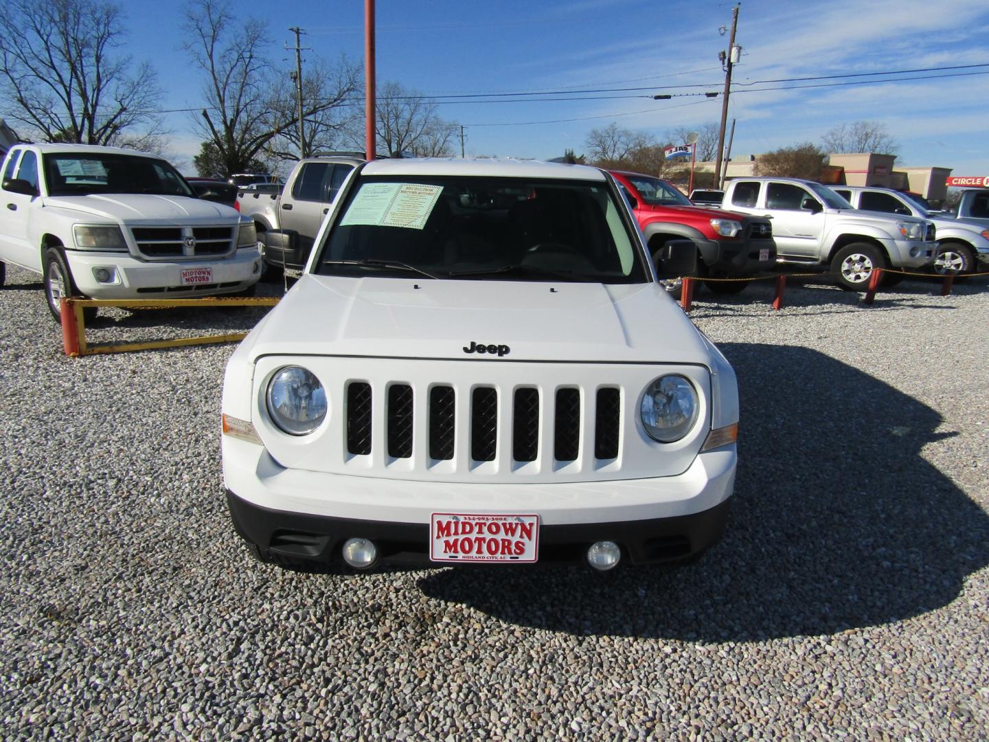 2015 White /Gray Jeep Patriot Sport 2WD (1C4NJPBA2FD) with an 2.0L L4 DOHC 16V engine, Automatic transmission, located at 15016 S Hwy 231, Midland City, AL, 36350, (334) 983-3001, 31.306210, -85.495277 - Photo#1